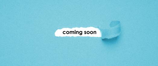 teksti , jossa lukee coming soon